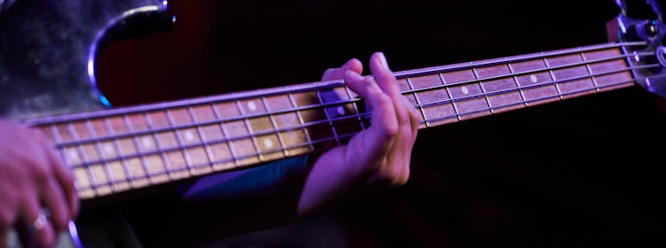 Kid learns to play bass at School of Rock Pleasanton